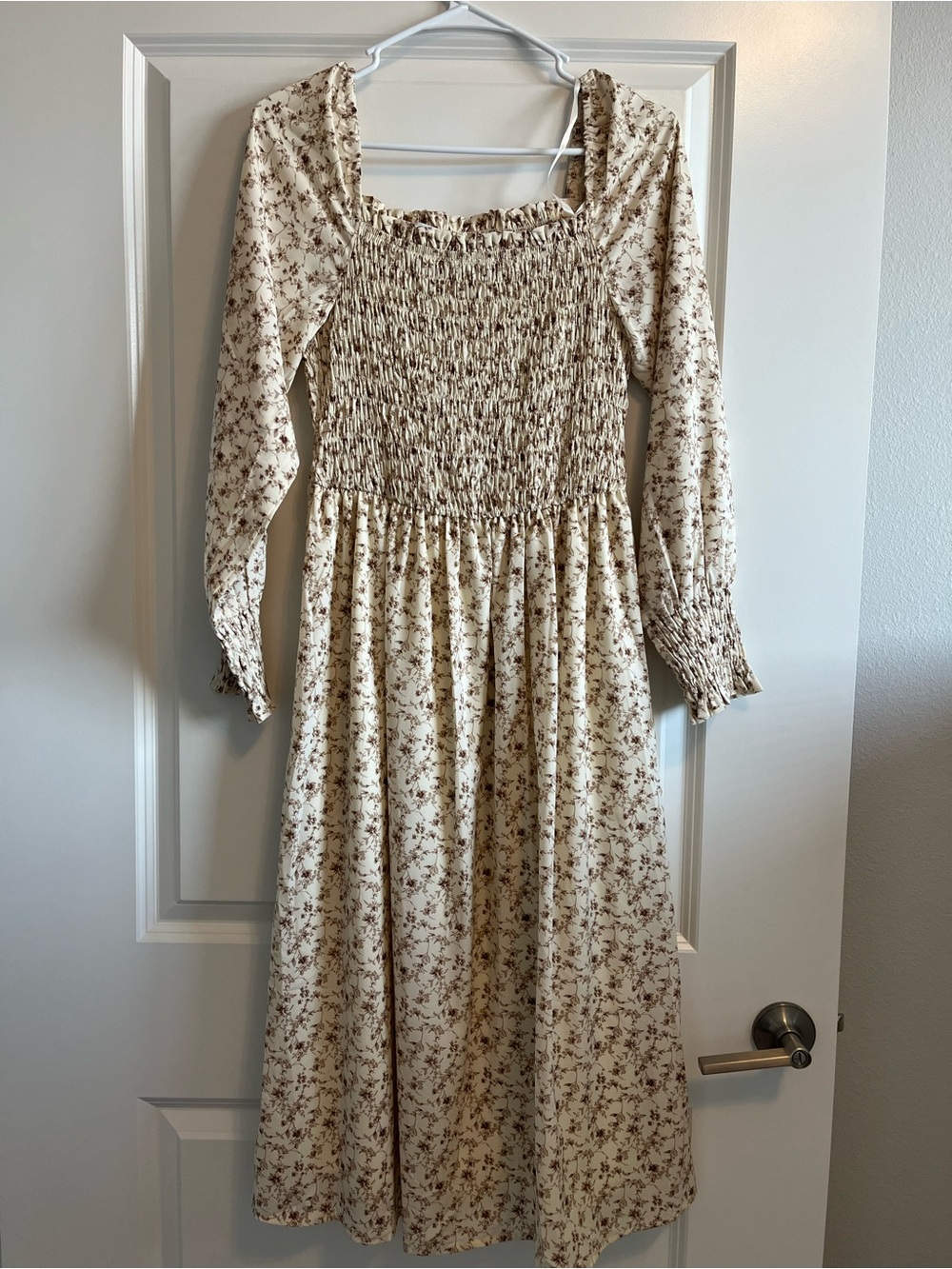 Smocked cream and brown floral dress.